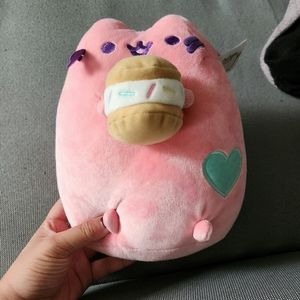 Claire's pink pusheen